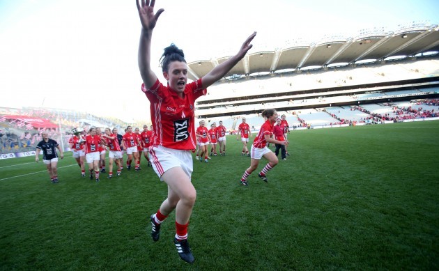 Doireann O'Sullivan celebrates with a cart wheel at the end of the game