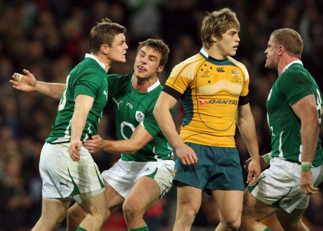 Tommy Bowe and Jamie Heaslip celebrate with Brian O'Driscoll