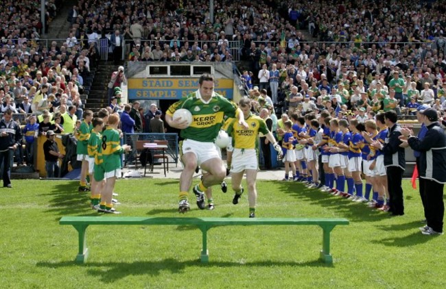 Declan O'Sullivan leads the team out