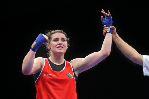 Katie Taylor celebrates winning a gold medal