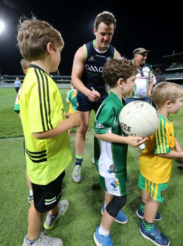 Michael Murphy signs autographs for supporters