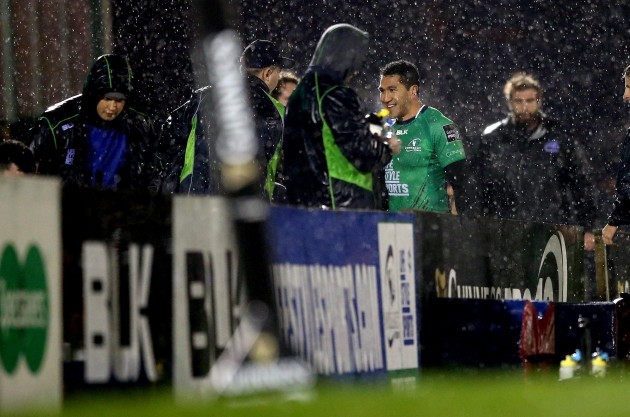 Mils Muliaina celebrates with the players on the bench as he is replaced