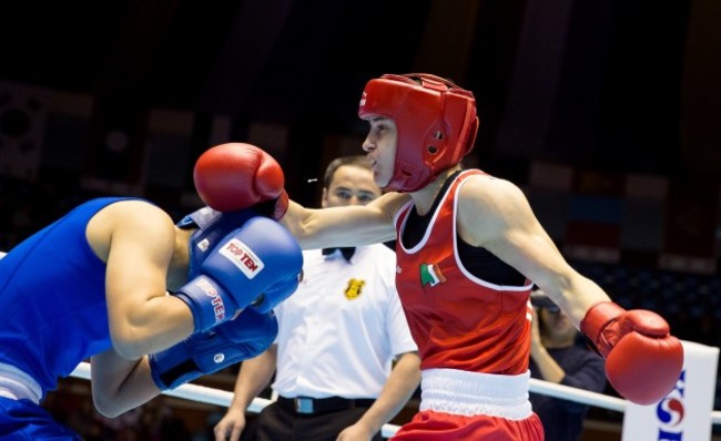 Katie Taylor with Jinhua Yin 23/11/14