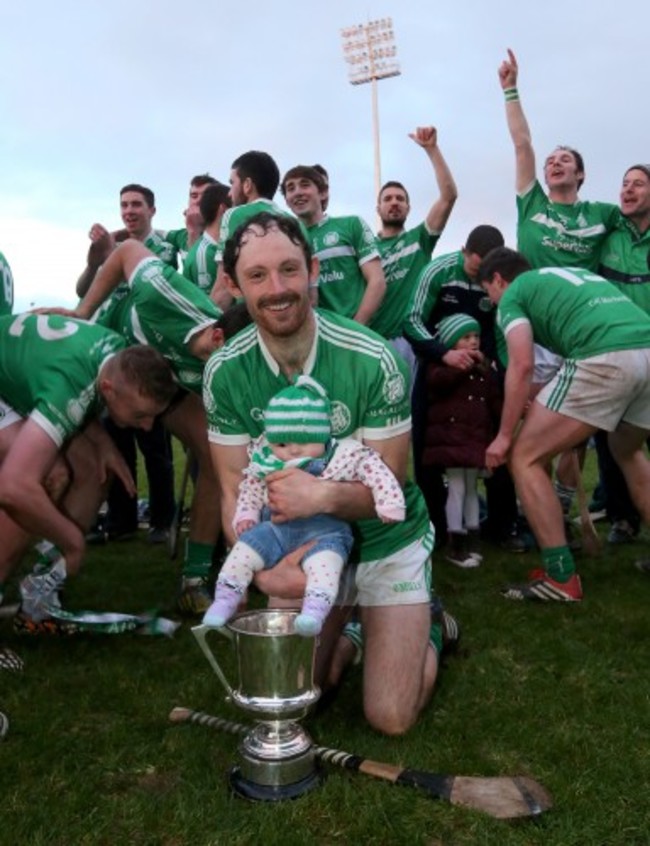 Paudie and Fiadh O'Brien celebrate with the trophy