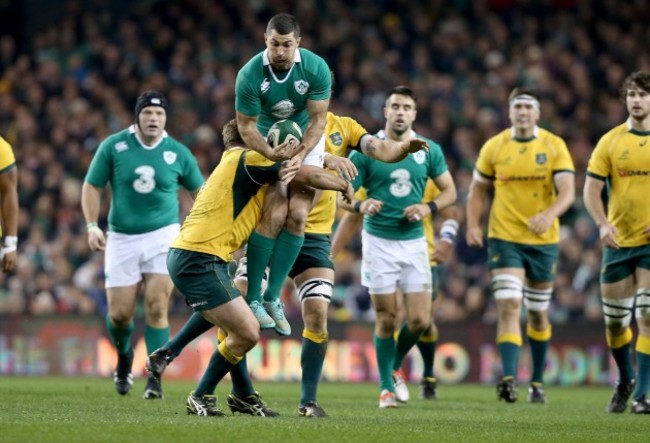 Rob Kearney tackled by James Slipper