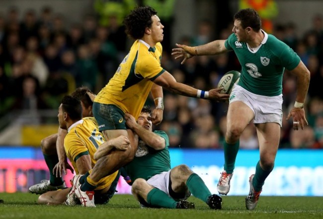 Gordon D'Arcy and Robbie Henshaw tackle Matt Toomua