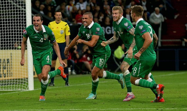 John Oohn O'Shea celebrates scoring the equalising goal