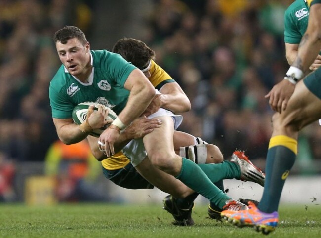 Robbie Henshaw is tackled by Luke Jones