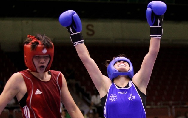Katie Taylor celebrates winning the her 3rd world championship