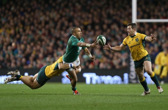 Bernard Foley stops Simon Zebo's offload to Jonathan Sexton as he is tackled by Matt Toomua