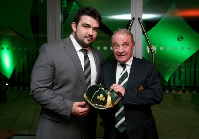 Martin Moore receives his first cap from Pat Fitzgerald
