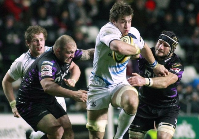 Dominic Ryan tackled by Craig Mitchell and Marti Holah 28/11/2010