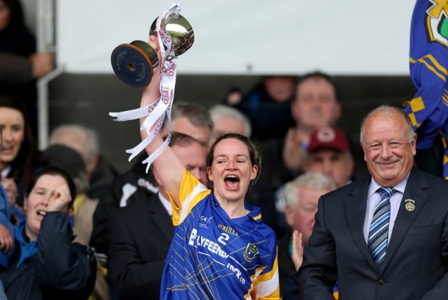 Feena Beirne lifts the cup