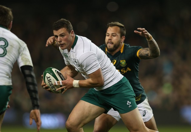 Robbie Henshaw is tackled by Francois Hougaard