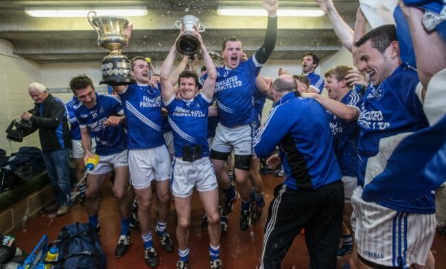 The Cratloe team celebrates in the dressing rrom