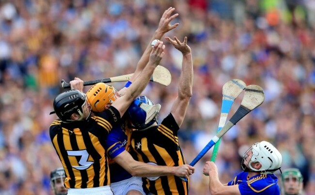 JJ Delaney and Brian Hogan with Seamus Callanan