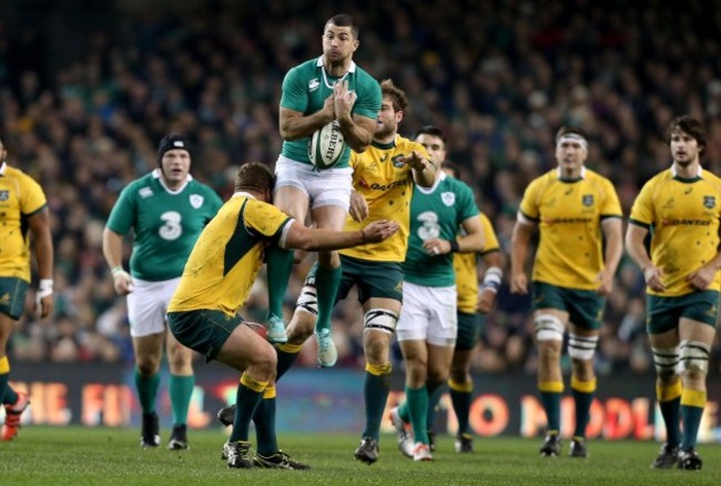 Rob Kearney tackled by James Slipper