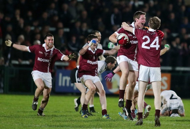 Slaughtneil players celebrate the final whistle