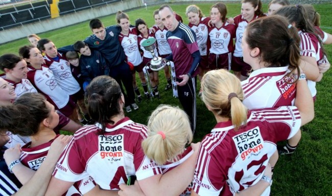 Francie Friel speaks to his players after the game