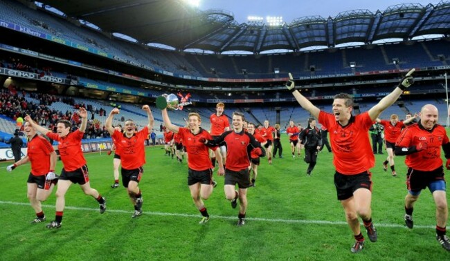 Truagh Gaels players celebrate with the cup at the end of the match