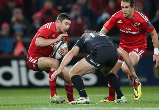 MunsterÕs Felix Jones is tackled by SaracensÕs Marcelo Bosch