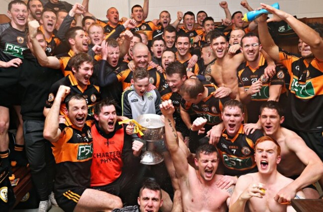 Austin Stacks players celebrate with the cup
