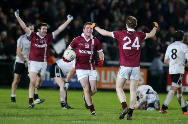 Slaughtneil players celebrate the final whistle