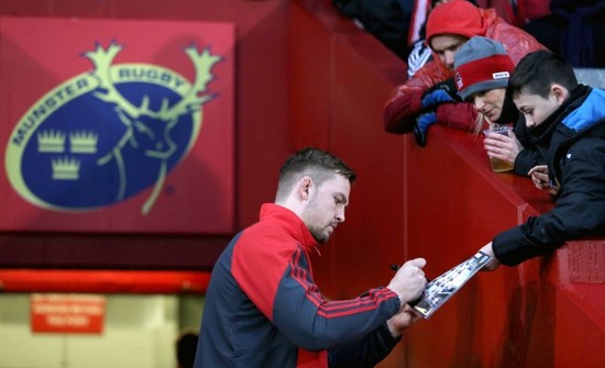 Dave Foley signs autographs before the game