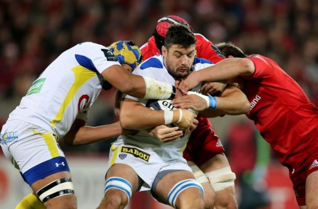 CJ Stander and Tommy O'Donnell tackle Damien Chouly