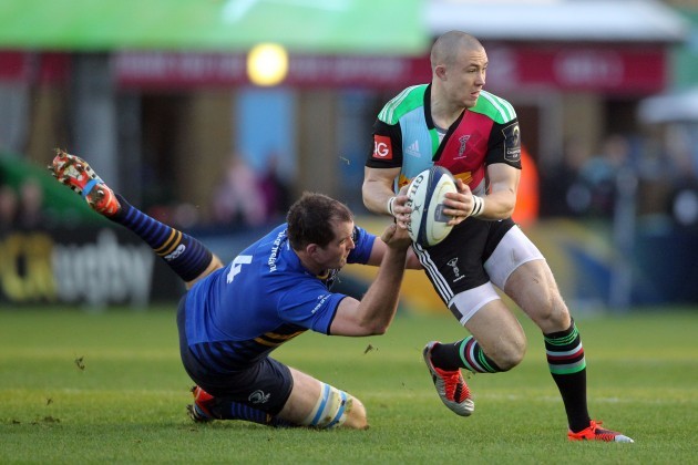 Mike Brown goes past Devin Toner