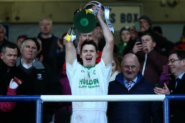 TJ Reid lifts the trophy