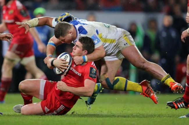 Ian Keatley is tackled by Benjamin Kayser