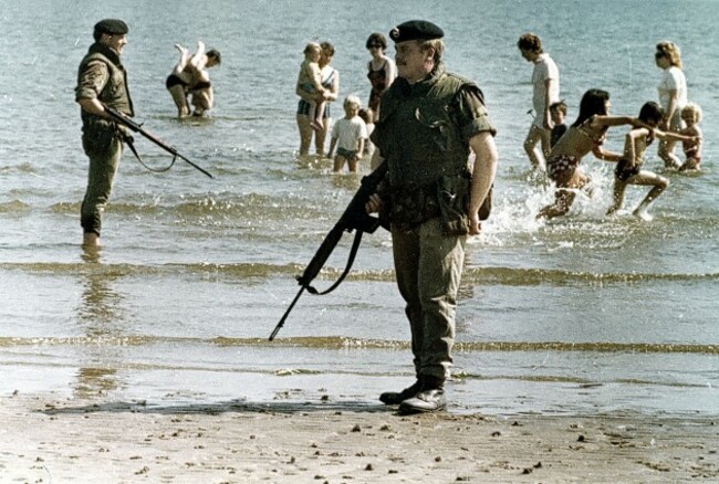 BRITISH TROOPS GUARD BEACH