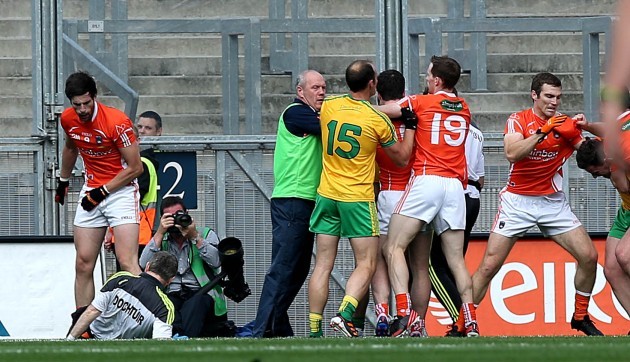 Aaron Findon pushes over the Donegal team doctor