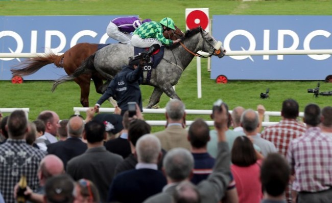 Ryan Moore onboard The Grey Gatsby comes home to win just ahead of Australia ridden by Joseph O'Brien