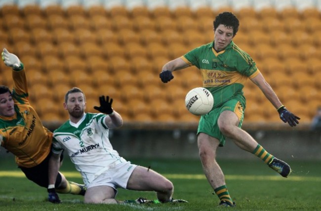 Paul McPadden fails to score tackled by Tom Corley and Liam Callaghan