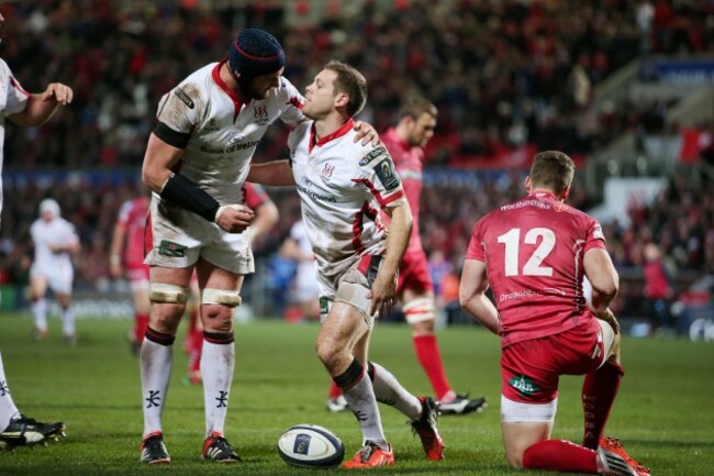 Darren Cave celebrates his try with Dan Tuohy