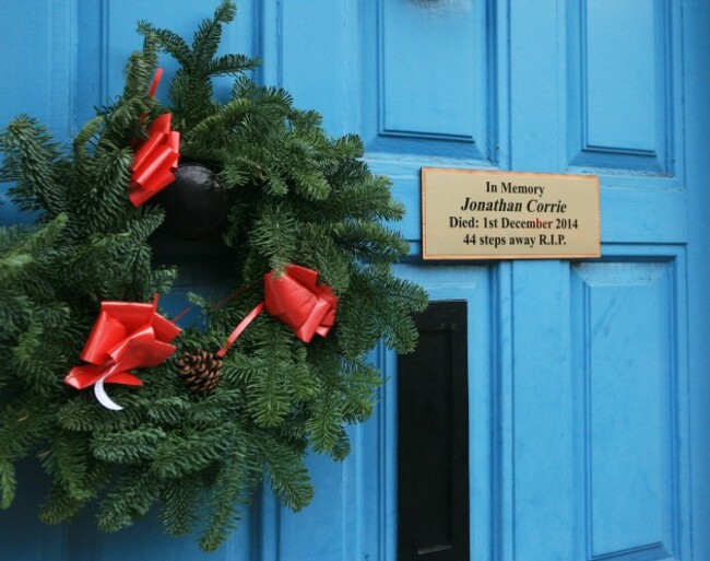 A plaque hangs on the door where homeless