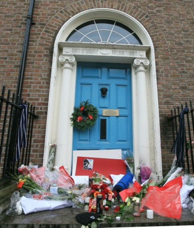 A plaque hangs on the door where homeless