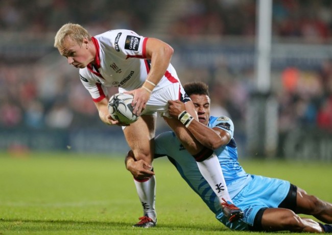 Luke Marshall is tackled by David Odiete