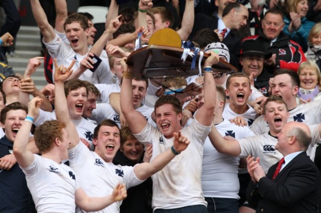 Michael Lagan lifts the cup