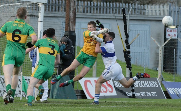 Ken Garry bravely saves from the oncoming Shane Carthy