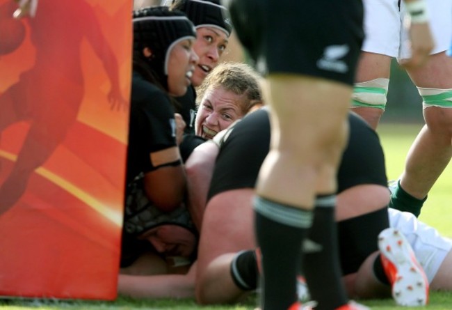 Fiona Coghlan celebrates as Heather O'Brien scores a try 5/8/2014