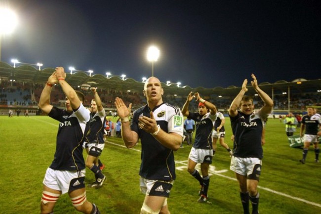 Paul O'Connell and Denis Fogarty applaud the Munster fans after the game