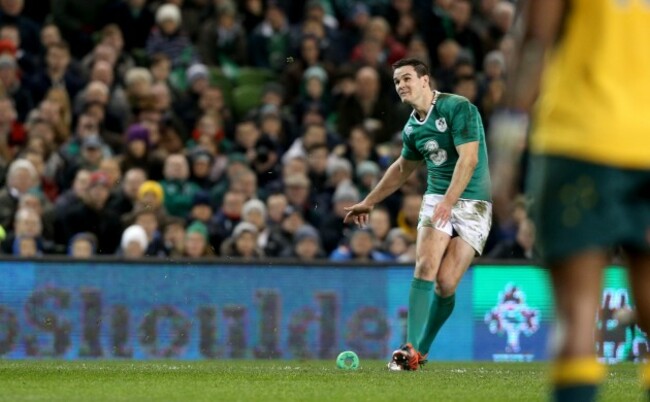 Jonathan Sexton kicks a penalty to tie the game at half-time