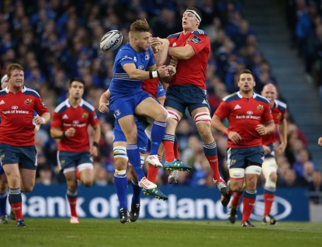 Ian Madigan and Robin Copeland go for the ball