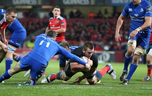 CJ Stander scores a try after losing his jersey