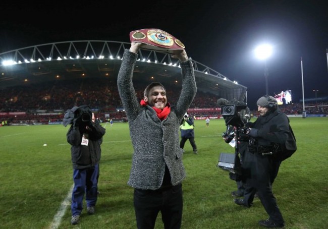 Andy Lee shows his belt off to the Munster fans at Halftime