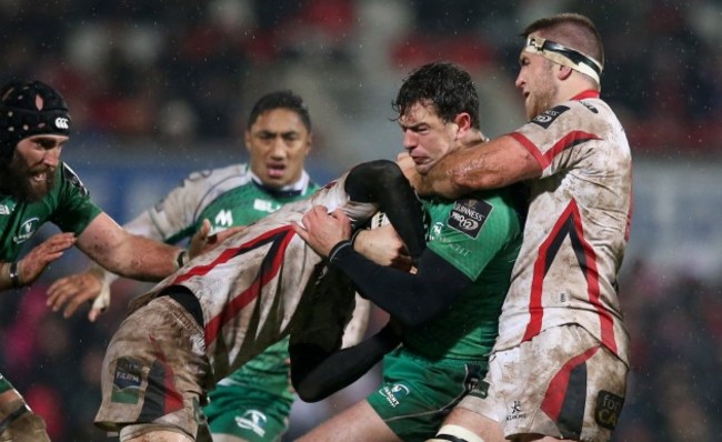 Darren Cave and Alan O'Connor tackle Danie Poolman