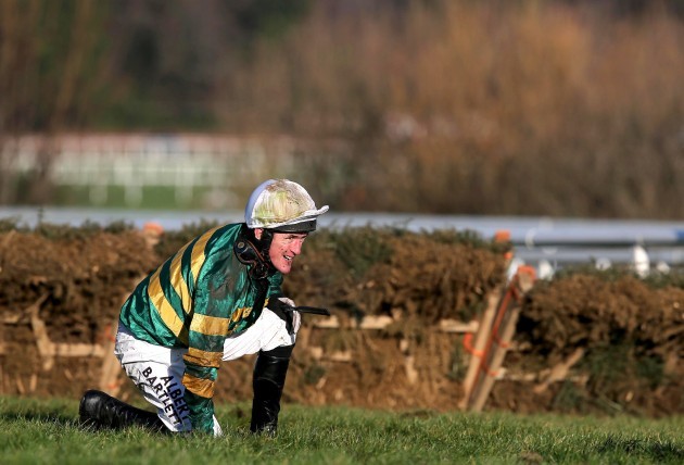 AP McCoy looks on after falling from Speckled Wood
